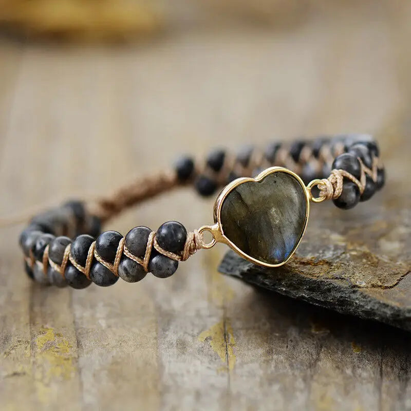 Artistic heart charm bracelet with handcrafted beadwork