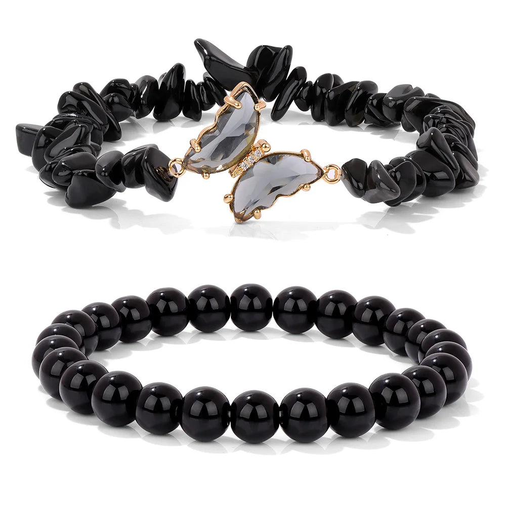 Black onyx and clear quartz bracelet with butterfly centerpiece