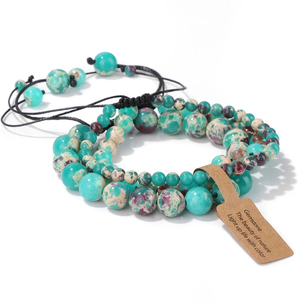 Blue and black gemstone bracelet set with celestial charms