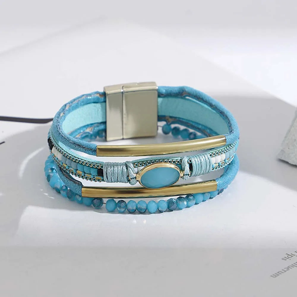 Brown leather wrap bracelet with silver crystal details