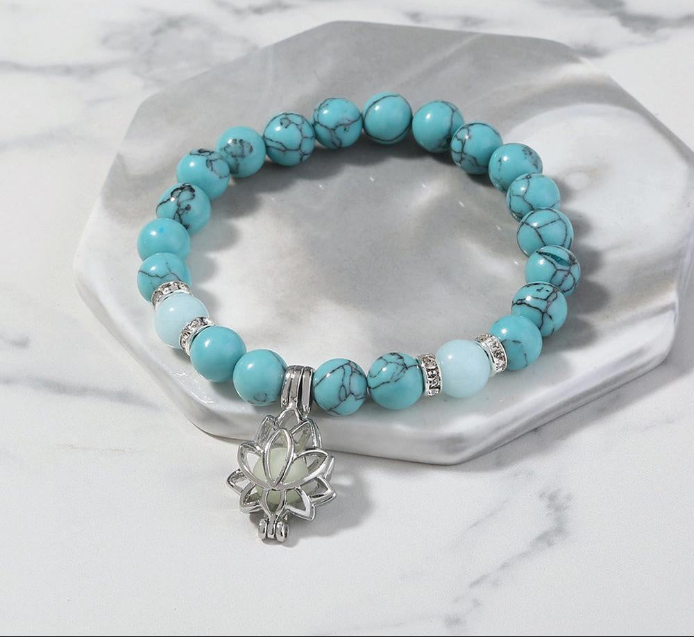 Chakra balancing bracelet with luminous stones