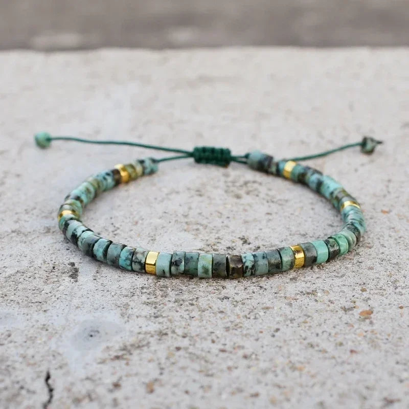 Close-up of handmade African turquoise yoga bracelet for men and women