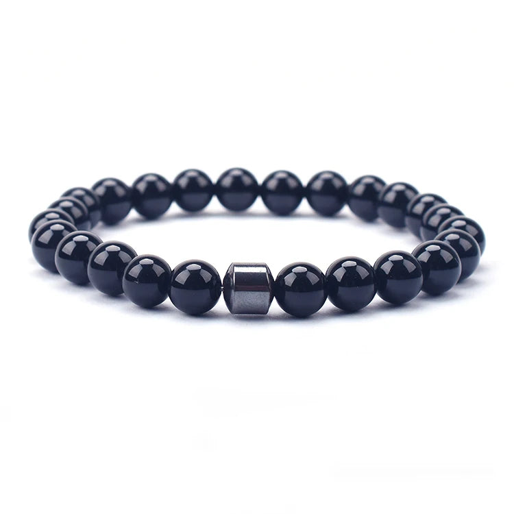 Close-up of lava stone and Citrine gemstone bracelet
