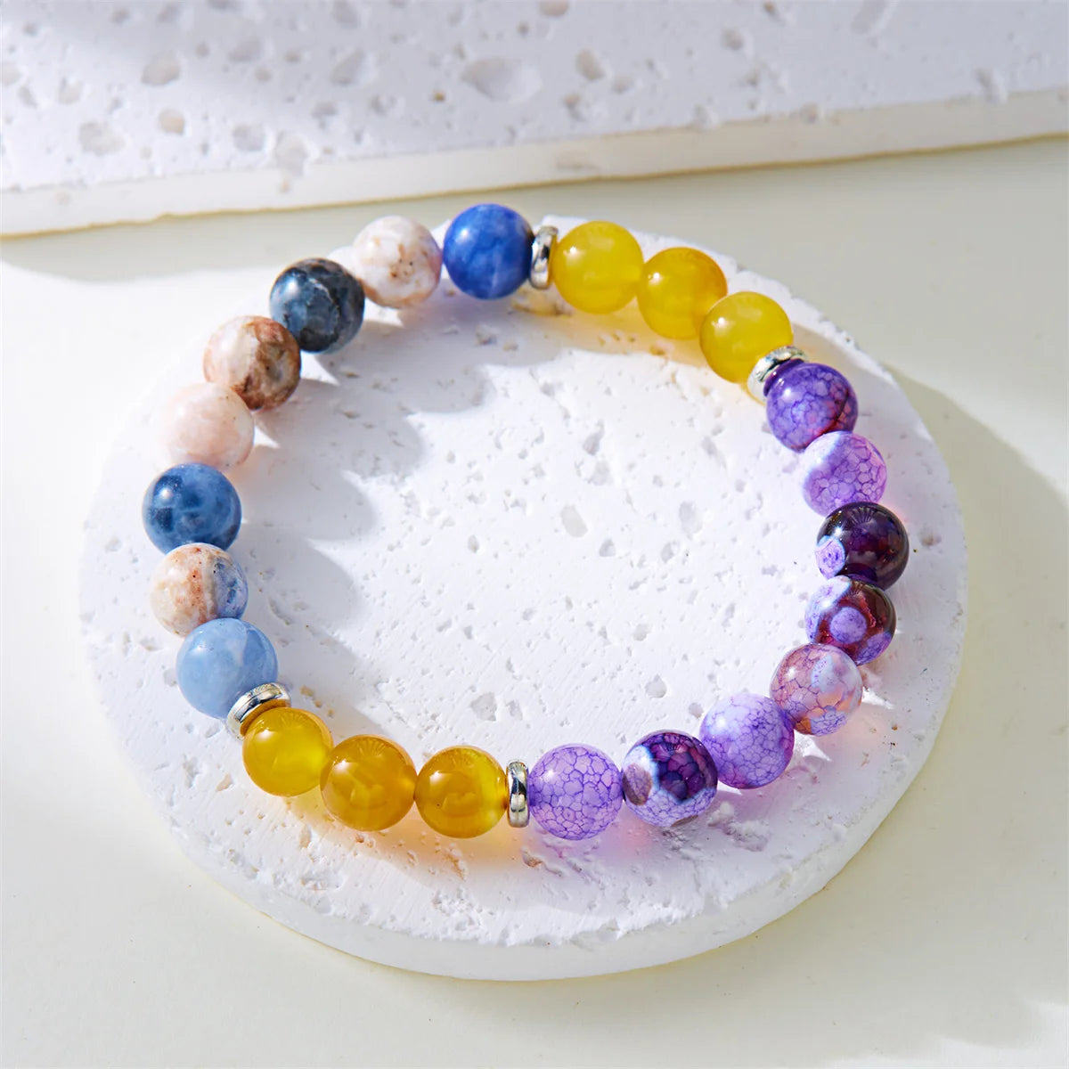 Close-up of love and success stone bracelet