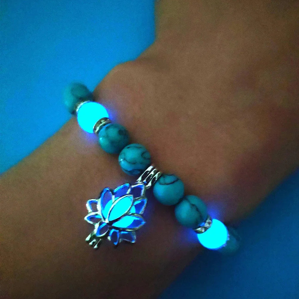 Close-up of luminous bracelet glowing in the dark