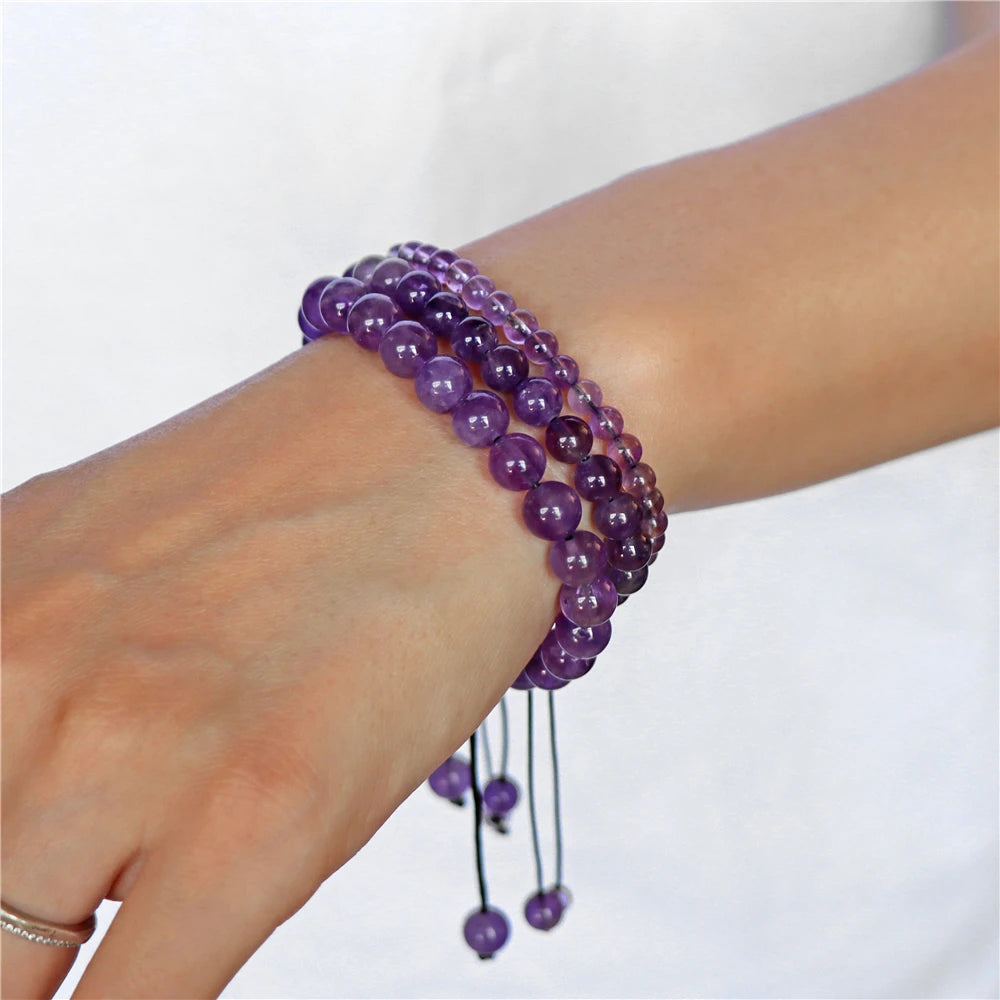 Close-up of luminous green beads on a beaded bracelet