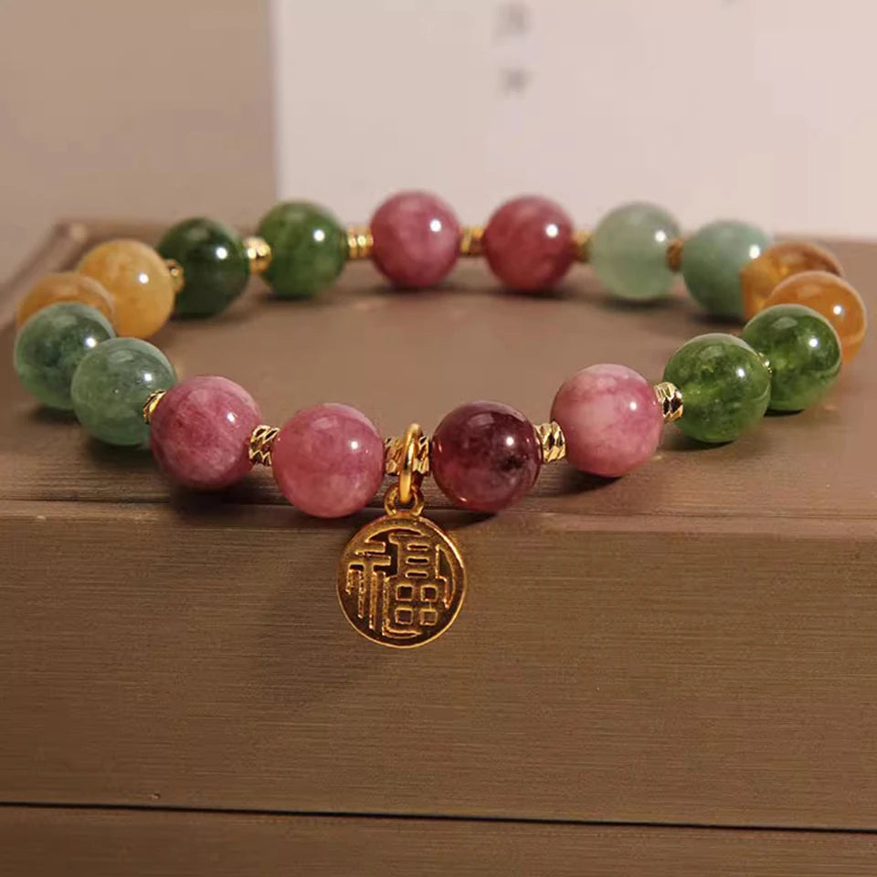 Delicate jade bracelet with natural tourmaline stones