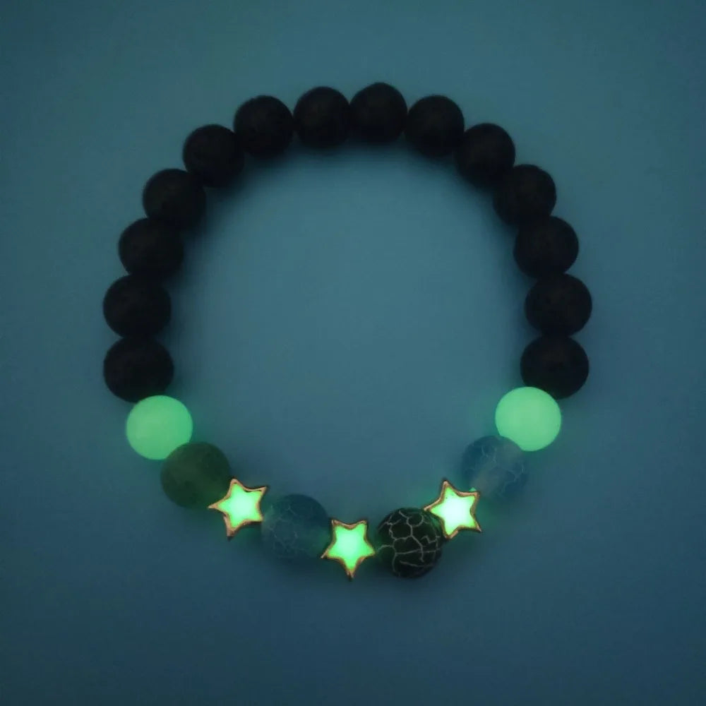 Fashion jewelry bracelet glowing beside candlelight