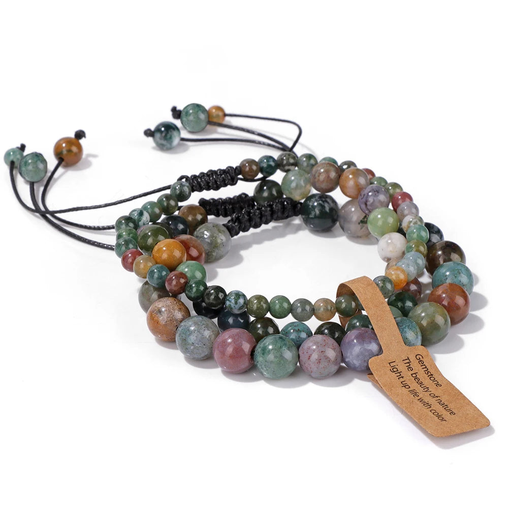 Glow-in-the-dark lotus charm bracelet on wrist