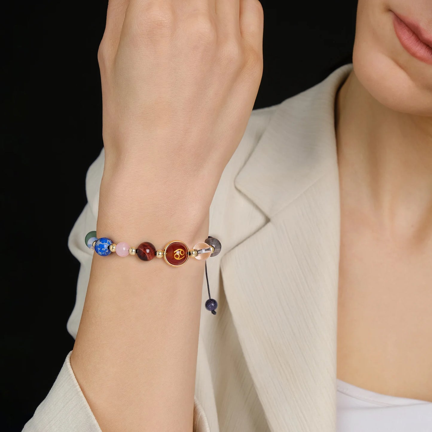 Handmade constellation bracelet with colorful chakra stones.