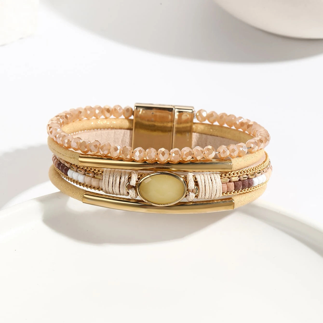 Handmade crystal leather bracelet in teal and gold