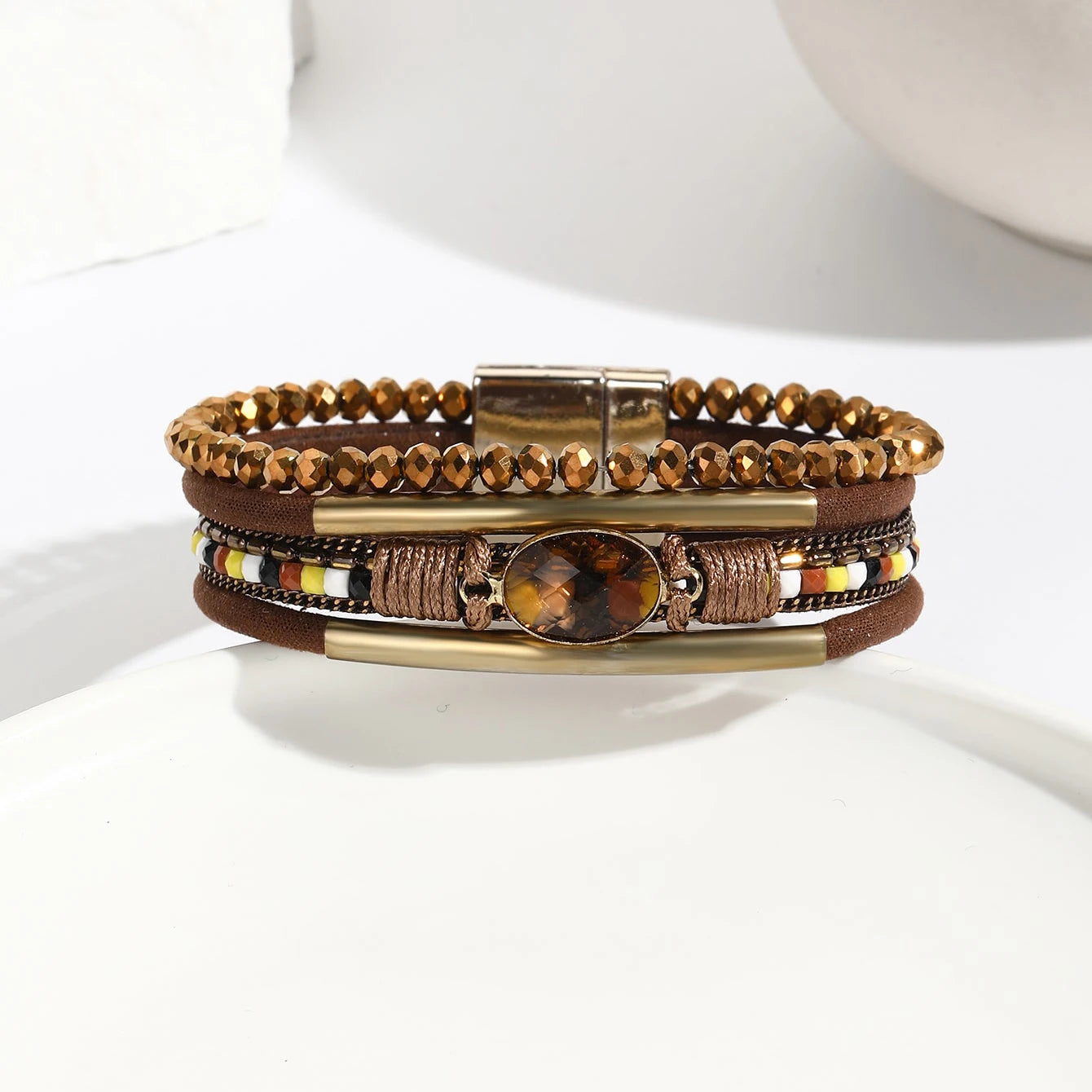 Layered leather bracelets in black and silver theme