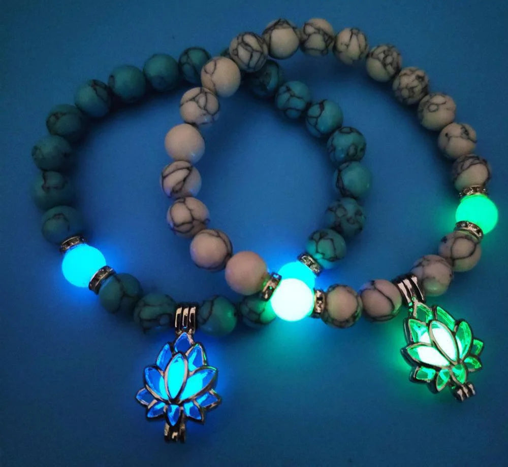 Luminous chakra bracelet glowing in the dark