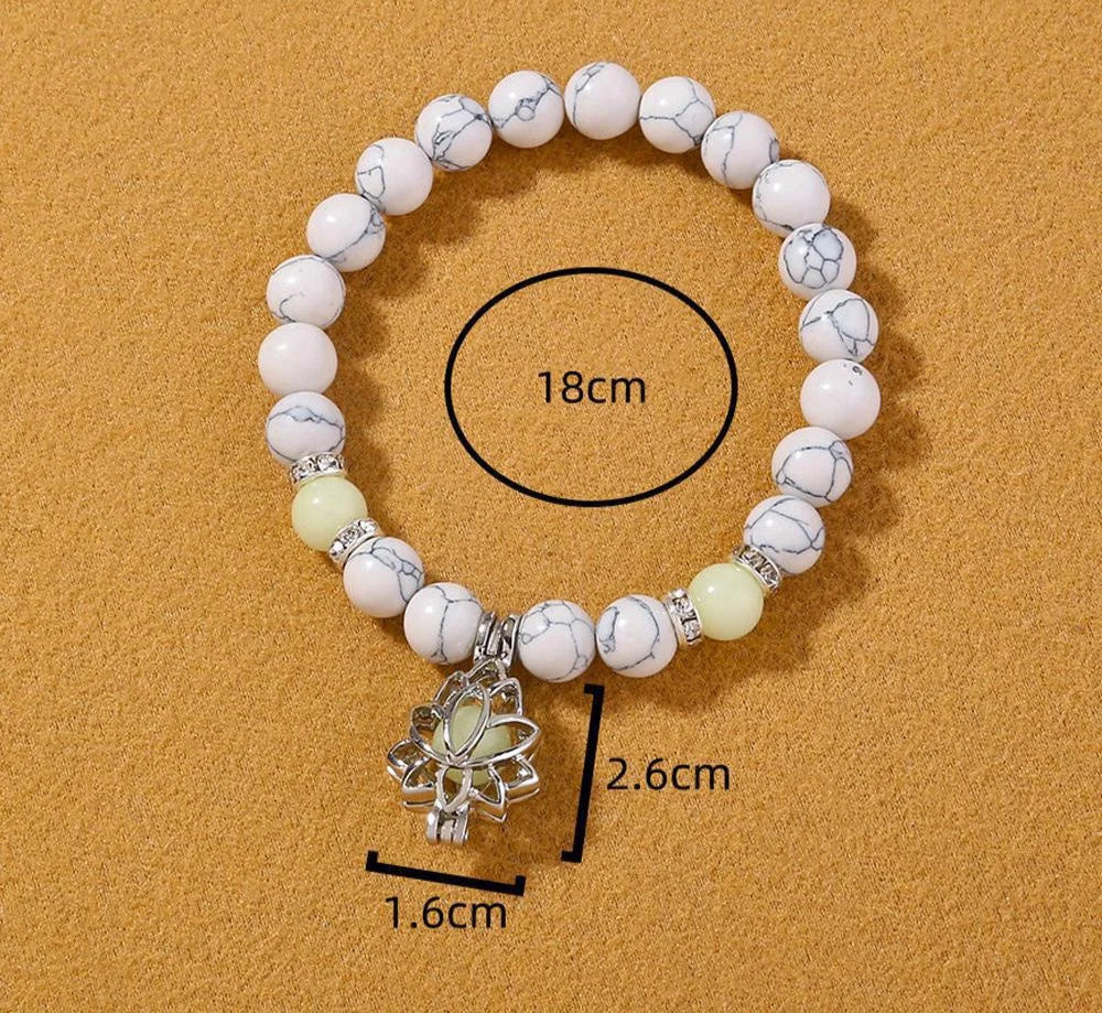 Meditation with glowing bracelet on hand