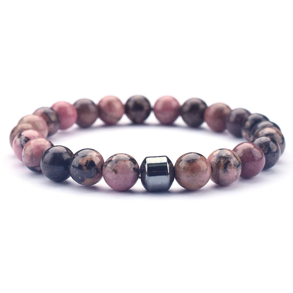 Mixed gemstone bracelet glowing under natural sunlight