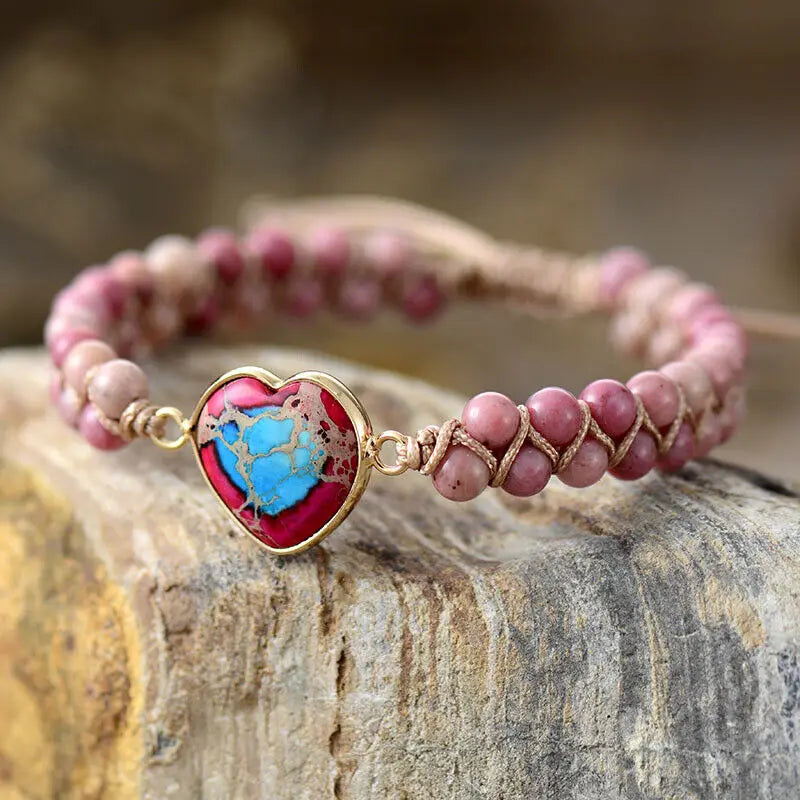Natural stone beaded bracelet featuring love heart centerpiece