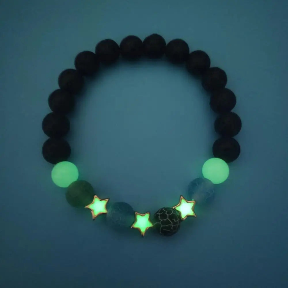 Natural stone charm bracelet glowing in the dark