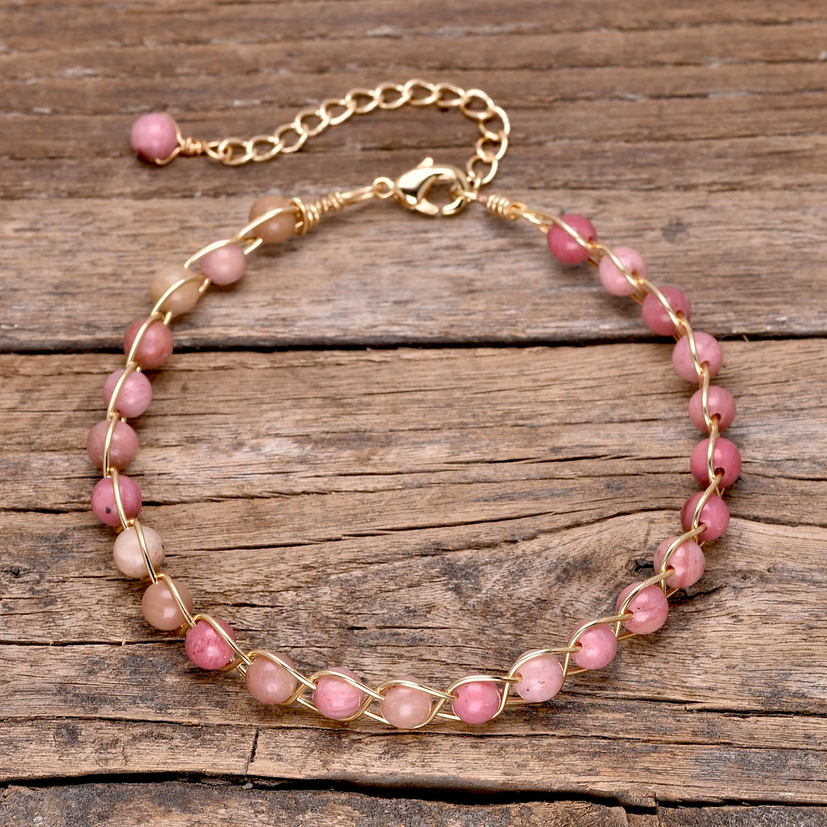 Rhodonite bracelet with copper detailing