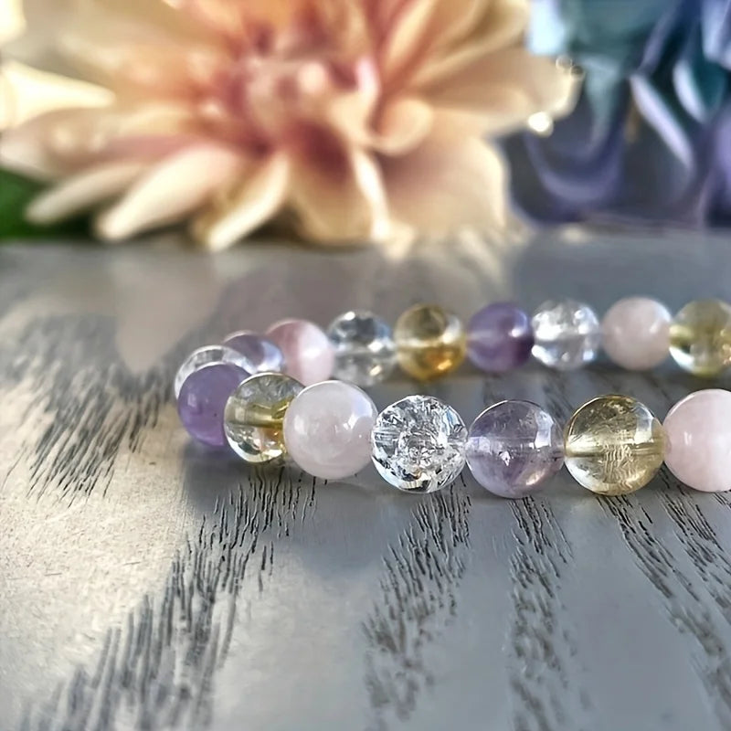 Stretch crystal bracelet featuring amethyst and clear quartz