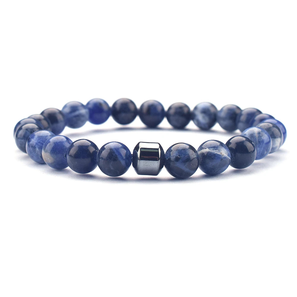 lapis tiger eye - Stack of energy bracelets styled in boho fashion