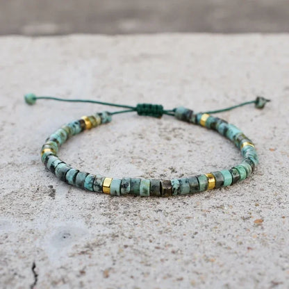 Close-up of handmade African turquoise yoga bracelet for men and women