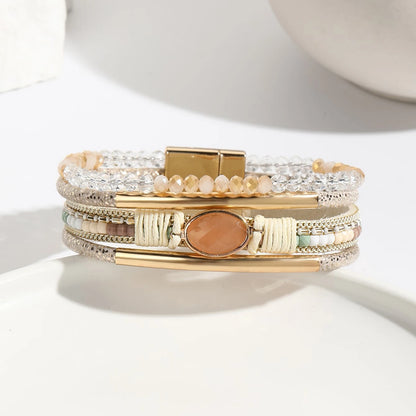 Close-up of stitching and crystal placement on bracelet