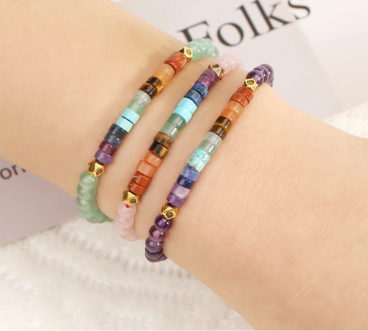 Fashionable spiritual bracelet featuring 7 chakra stones on wrist