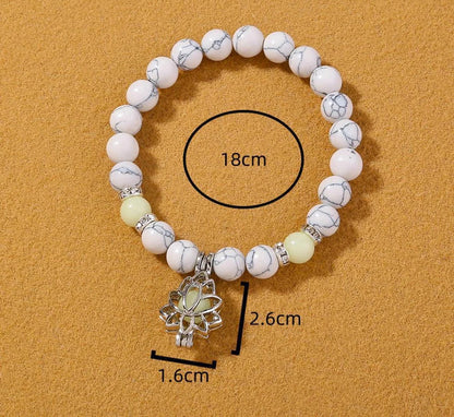 Meditation with glowing bracelet on hand

