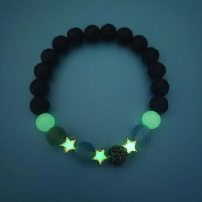 Natural stone charm bracelet glowing in the dark