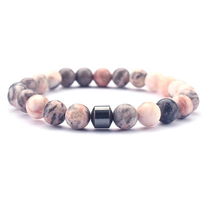 Stretch beaded bracelet on wooden display stand