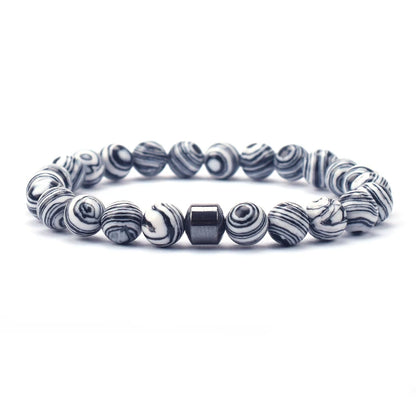 White Malachite gemstone bracelet styled with yoga outfit