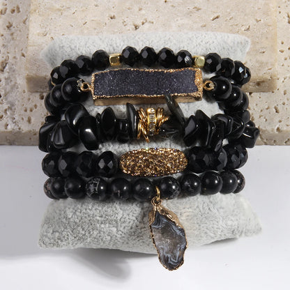 black gemstone beaded bracelet with druzy charm