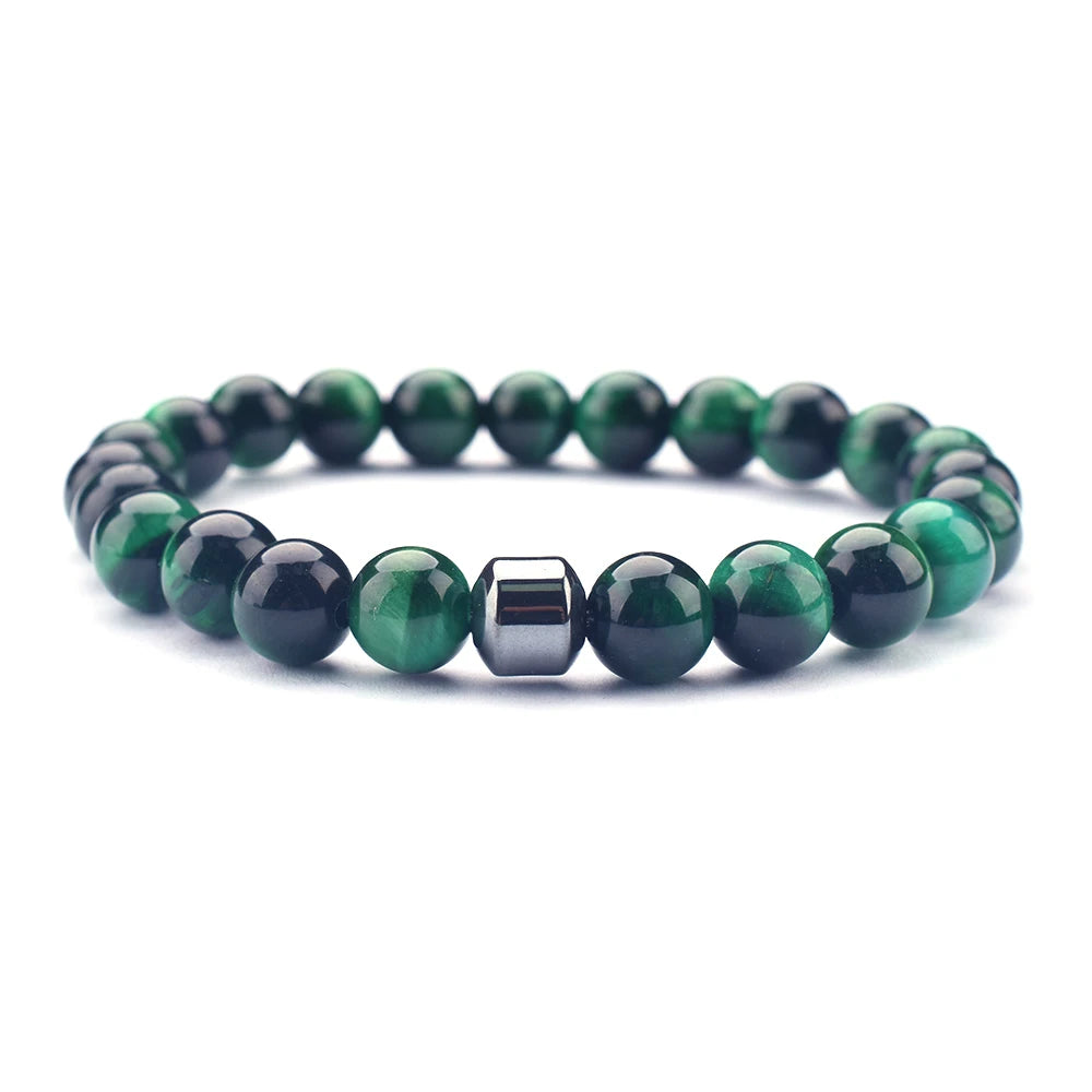 green tiger eye bracelet close-up on white linen