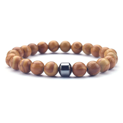 yellow wood grain  love energy bracelet styled on wrist